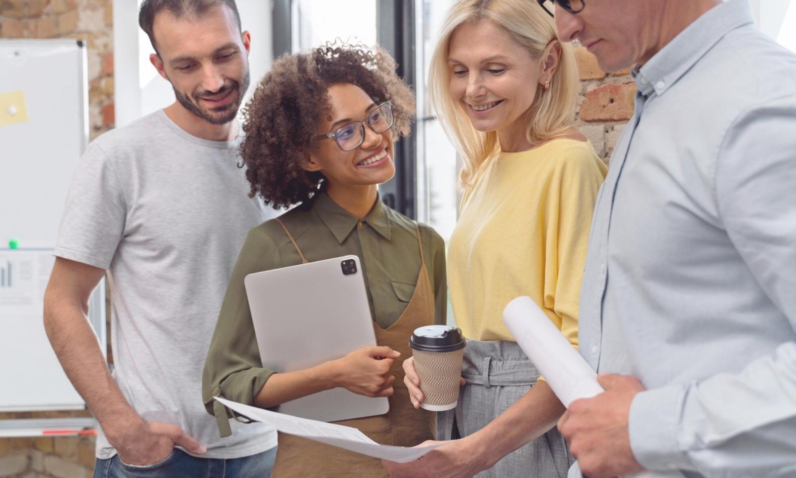 Students working on financial models in modern learning environment