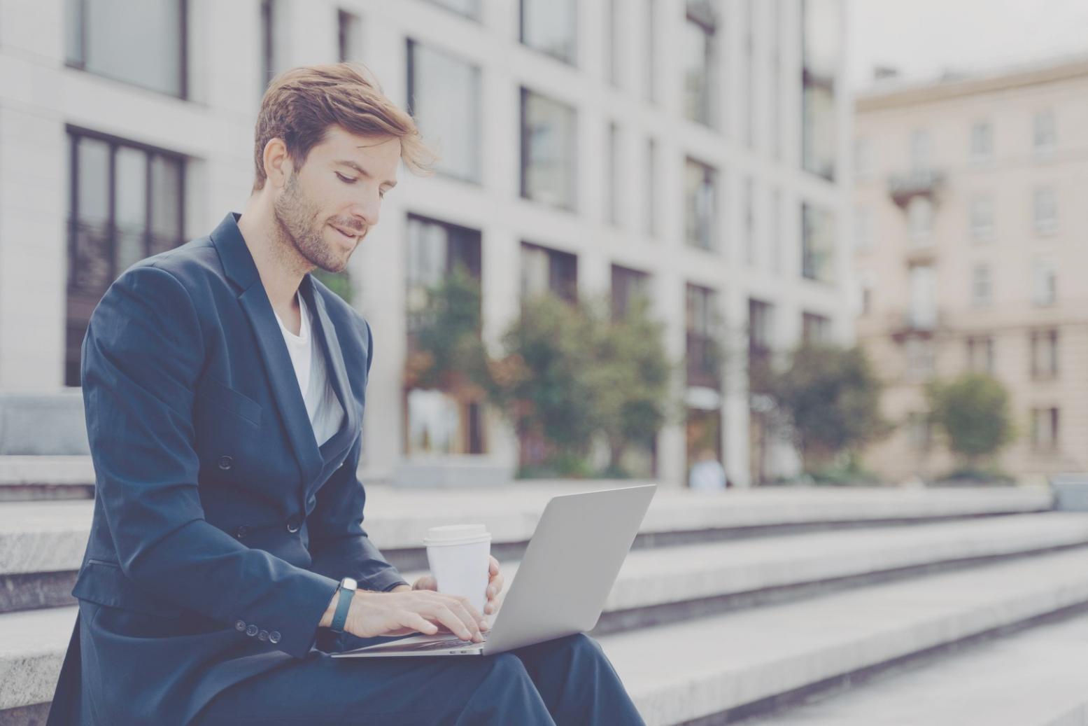 Financial research workspace showing market analysis documents and computer screens